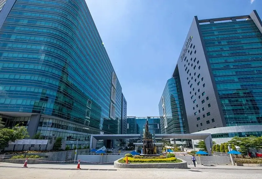 Modern glass buildings under blue sky